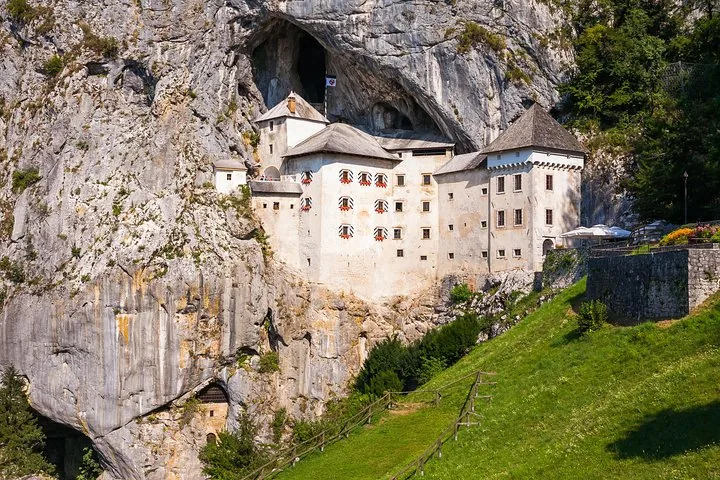 Predjama Castle built into a rocky cliff face, Slovenia